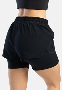 Spyder Träningsshorts - black