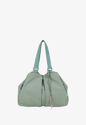 Sac à main en tissu vert avec deux longues anses, poches zippées à l'avant et un cordon attaché avec des embouts roses sur fond blanc.