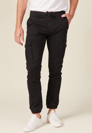 NIEDRIGE ENGE KAMPF - Pantalones cargo - noir