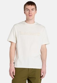 Timberland SHORT SLEEVE - Triko s potiskem - natural