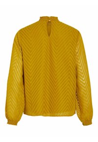 Blouse jaune à manches longues avec un motif chevron, un col smocké et un détail en trou de serrure au dos. Fabriquée en tissu léger et texturé.