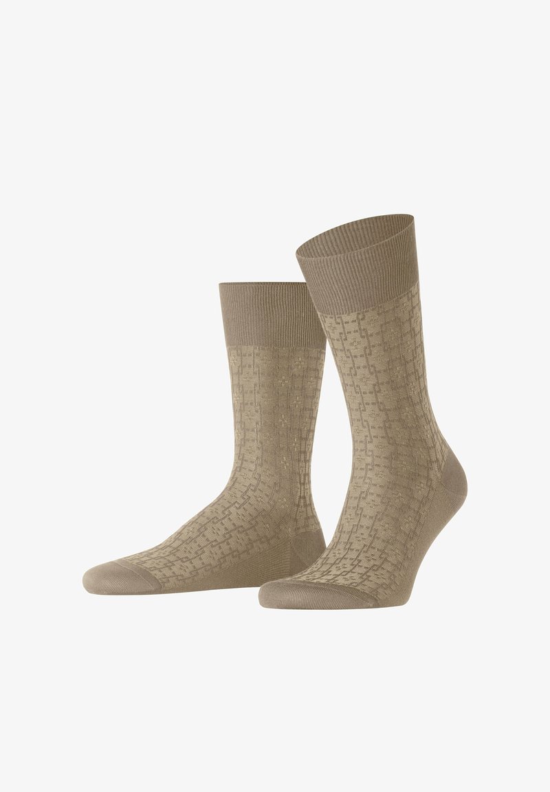 Beige Socken mit einem strukturierten Muster, gerippten Bündchen und glatter Textur. Das Design zeigt geometrische Formen über den gesamten Stoff.