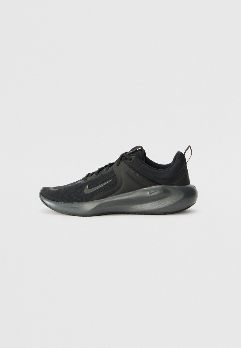 Black athletic shoe featuring a mesh upper, cushioned midsole, rounded toe, and subtle logo detailing on the side. Smooth, textured accents present.