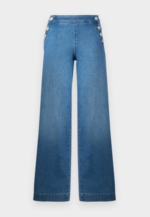 Brede blauwe denim broek met een hoge taille, knoopaccenten aan de zijkant en een schone zoom. De stof heeft een gladde textuur met een lichte vervaging.