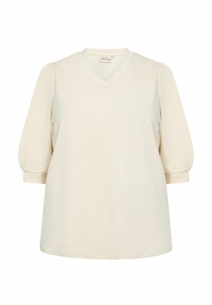 Cream-colored V-neck top with puffed short sleeves. Made of soft fabric, features a relaxed fit and subtle stitching details at the hem.
