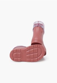 Stivali di gomma impermeabili rosa con un risvolto trasparente a pois e suole testurizzate, con il marchio "Igor" impresso sul lato.