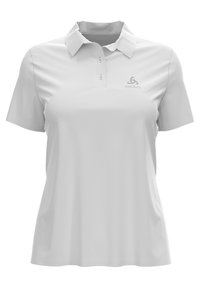 Vit polo med en texturerad tyg, korta ärmar och krage med knappar. Har en subtil logotyp i ljusgrått på bröstet.
