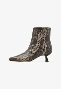 Selected, black brown multicolored snake print