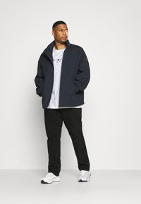 Tommy Hilfiger LOGO TEE - T-shirt estampada - white