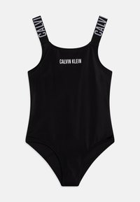 Črni enodelni kopalni kostim z tankimi naramnicami, s "CALVIN KLEIN" logotipom spredaj in črnimi napisi na belih poudarkih. Gladek, elastičen material.