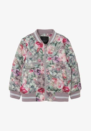 Giacca bomber trapuntata per ragazze con cerniera frontale, polsini a costine e motivo floreale multicolore su sfondo grigio chiaro.