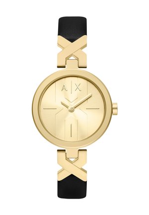 Guld rund ur med minimal urskive, gyldne visere, "A | X" logo og sort læderrem med gyldne X-formede forbindelser.