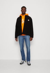 Levi's® 511 SLIM - Jeans straight leg - chanterelle cool
