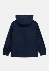 Κουκούλα μπουφάν ναυτικού μπλε με μακριά μανίκια και ελαστικές μανσέτες, εμφανίζεται από πίσω σε λευκό φόντο.