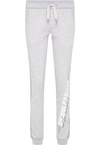 Graue Sweatpants mit einem Kordelzug-Bund, seitlichen Taschen und bedrucktem Text entlang des linken Beins. Hergestellt aus weichem, strapazierfähigem Material.