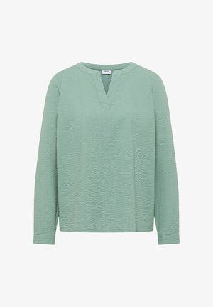 Blusa verde chiaro a maniche lunghe con trama, scollo tondo con spacco e maniche con polsini.