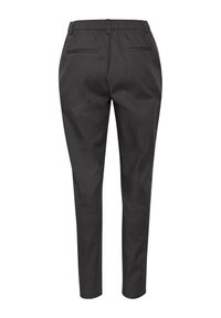 Black, stretchy trousers with an elastic waistband, slim fit, two back pockets, and a smooth fabric texture.