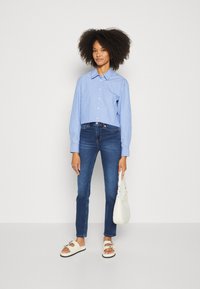 Marks & Spencer Jeans slim fit - med blue denim