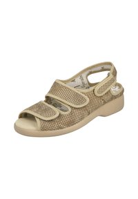 Sandal de punta abierta color beis, fabricado con material de malla, con tres correas ajustables de velcro, suela de goma sólida y un diseño texturizado.