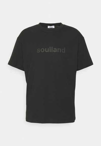 Černé bavlněné tričko s krátkými rukávy, s kontrastním tmavě šedým logem "soulland" na přední straně. Klasický kulatý výstřih, uvolněný střih.