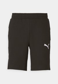 Svarta shorts i mjukt tyg med resårmidja och en vit Puma-logga på vänster sida. Slät yta, längd ovanför knäet.