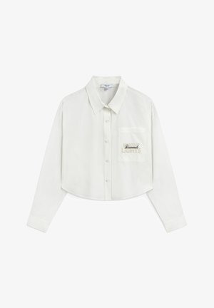 Gekürzte weiße Hemd mit Knöpfen aus glattem Stoff, ausgestattet mit einer Brusttasche, in die "Diamanten" in Gold gestickt ist, sowie einem klassischen Kragen.