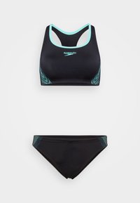 Černý bikini set, který obsahuje sportovní podprsenku s tyrkysovými detaily a bočními akcenty. Spodní část má odpovídající akcenty a klasický střih.