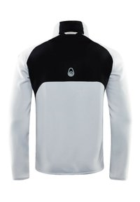 Långärmad jacka med en svart övre yoke, ljusgrå nedre del och en rundad krage. Materialet verkar mjukt med en smidig yta.