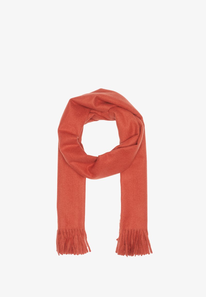 Écharpe orange en tissu doux, avec des extrémités à franges et une texture lisse, disposée en boucle.