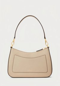 Béžová kožená kabelka přes rameno s kulatým tvarem, kontrastním tmavým lemováním a zlatými kovovými doplňky. Má přední kapsu a zipové zapínání.