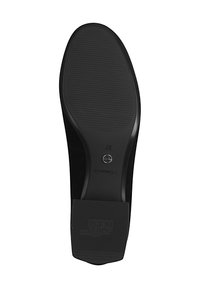 Semelle de chaussure en caoutchouc noir avec un motif de préhension texturé et un détail de logo circulaire. Taille marquée comme 37. Forme lisse et arrondie.