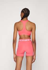 Nike Performance BRA - Sujetadores deportivos con sujeción media - aster pink/white