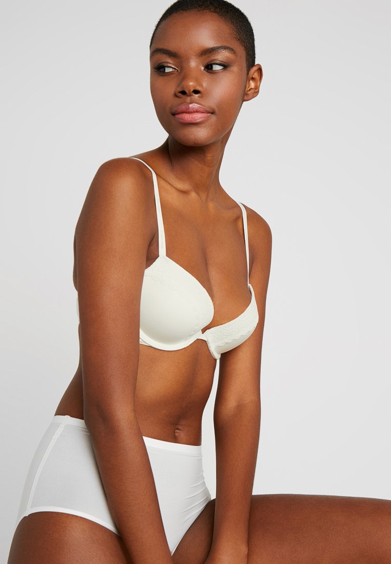 Calvin Klein Underwear FLIRTY PLUNGE - Push-up bra - ivory/off