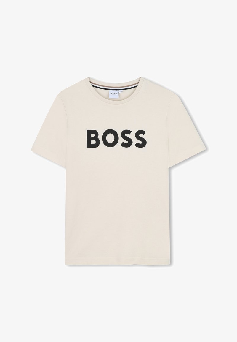 Lichtbeige katoenen t-shirt met een ronde halslijn en korte mouwen. Het oversized zwarte "BOSS" logo is prominent op de voorkant afgebeeld.