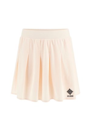 Pleated mini skirt in light peach fabric, featuring a wide waistband and an embroidered black logo on the lower side. Soft texture.
