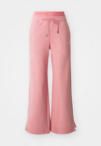 SPORTSWEAR PHOENIX FLEECE - Tracksuit bottoms - red stardust