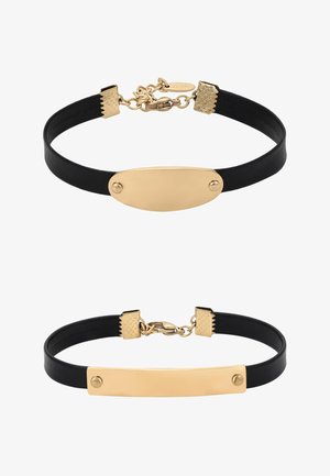 Două brățări din piele neagră cu plăcuțe metalice aurii: una ovală, una dreptunghiulară, ambele cu închizători aurii și lanțuri reglabile.