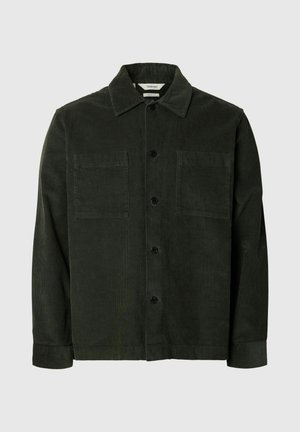 Dark green corduroy button-up jacket with two chest pockets and a classic collar on a light gray background.