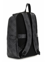 Sac à dos noir avec une finition texturée, doté de bretelles en maille rembourrées, d'une fermeture zippée et d'un motif de logo subtil. Idéal pour un usage quotidien.