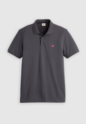 Σκούρο γκρι κοντομάνικο πόλο πουκάμισο με γιακά, κούμπωμα με δύο κουμπιά και μικρό κόκκινο λογότυπο Levi’s στο αριστερό στήθος.