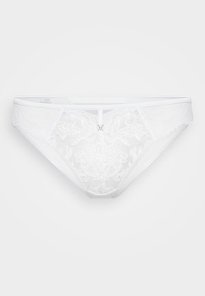 Hvit blondetanga med blomsterbroderi, trekantet form, elastisk livlinning og en liten sølvdetalj i midten foran.