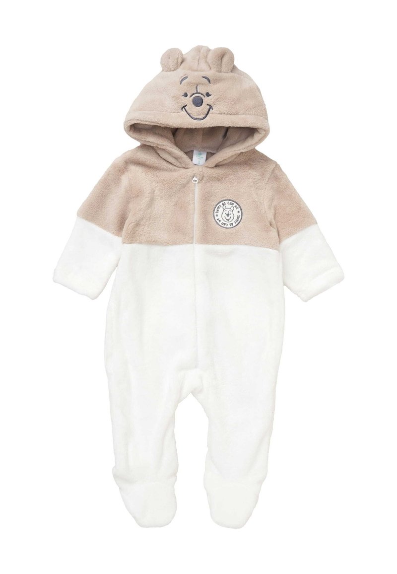 Tuta per neonati in pile beige e bianco con cappuccio, dotata di orecchie da orso e un viso di orso sorridente, zip frontale e una piccola toppa circolare a forma di orso.