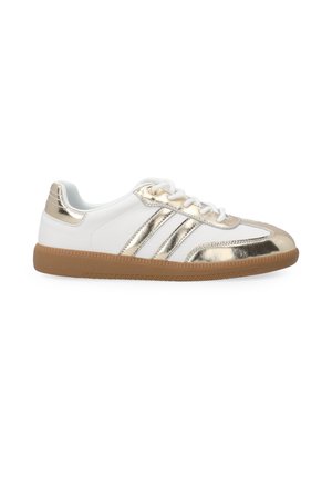 White sneakers with gold metallic accents, featuring three gold stripes, round toe, and a textured gum sole. Laces for secure fit.