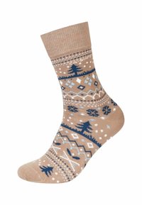 Calza beige a fantasia con alberi blu, fiocchi di neve e forme a diamante, dotata di bordo a costine e una superficie liscia.