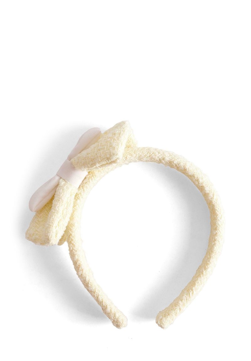 Żółta tkaninowa opaska na głowę o teksturowanej powierzchni, z dużą kokardą w jaśniejszym odcieniu i miękką różową wstążką wokół środka.