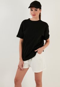 LOOSE FIT - T-shirt basic - black