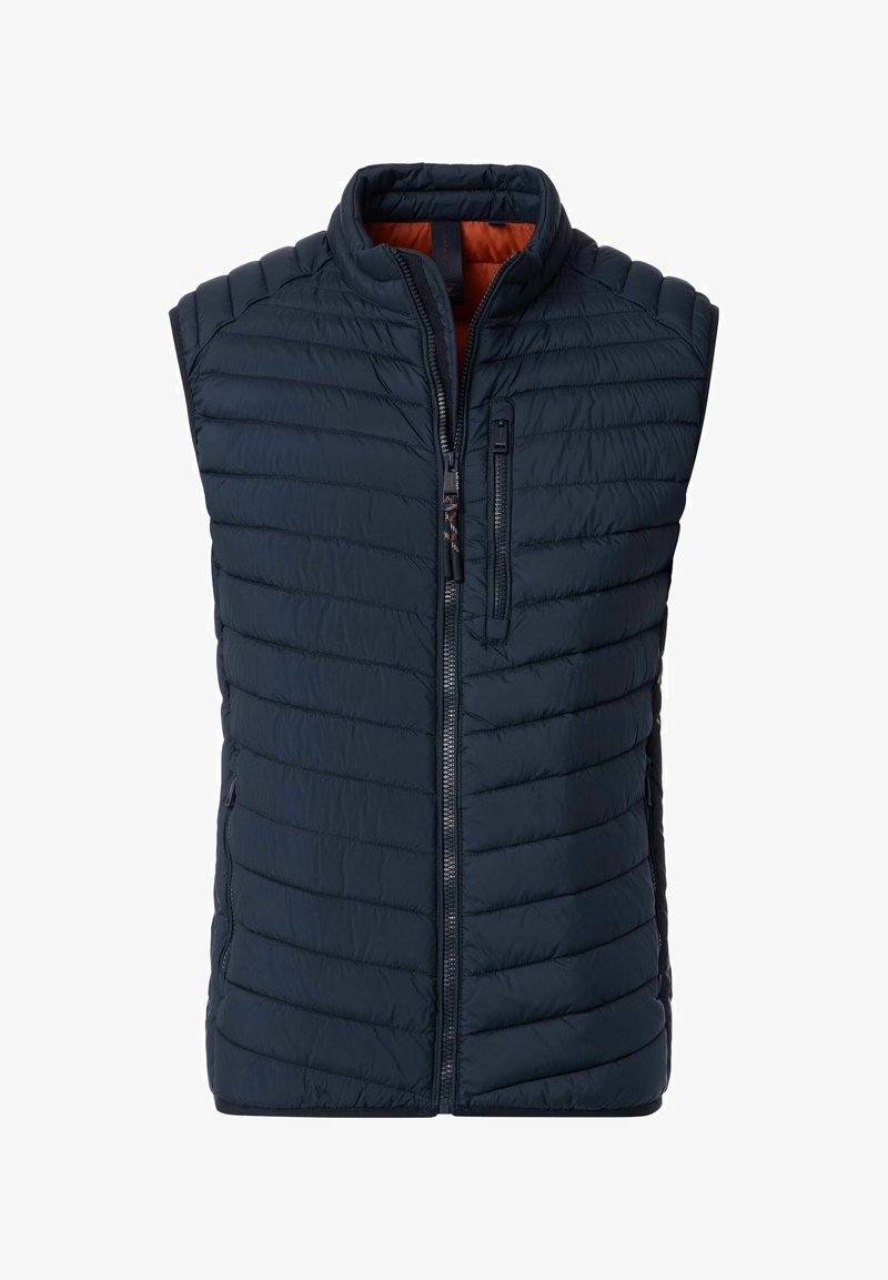 Marineblauwe samengestelde gewatteerde vest met verticale stiksels, hoge kraag, voorzijde met rits en één ritszak op de borst. Oranje voering is zichtbaar aan de binnenkant.