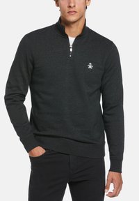 Dark gray pullover sweater with a quarter zip, ribbed cuffs, and a small embroidered logo on the chest. Soft fabric texture.