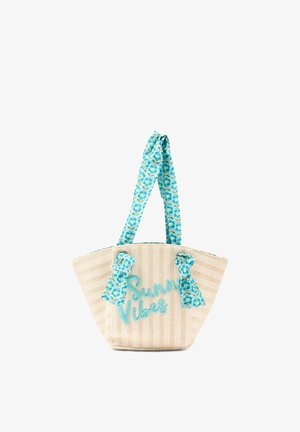 Sac cabas rayé beige avec anses et nœuds floraux bleus, arborant un texte turquoise "Sunny Vibes" à l'avant.