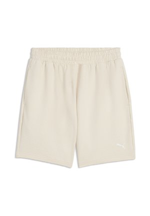 Pantalones cortos beige con cintura elástica, bolsillos laterales y un pequeño logo blanco de Puma en la pierna izquierda.